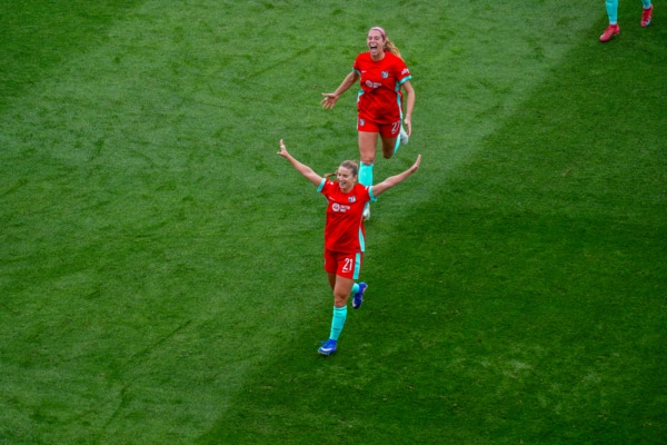 Players celebrating a goal.