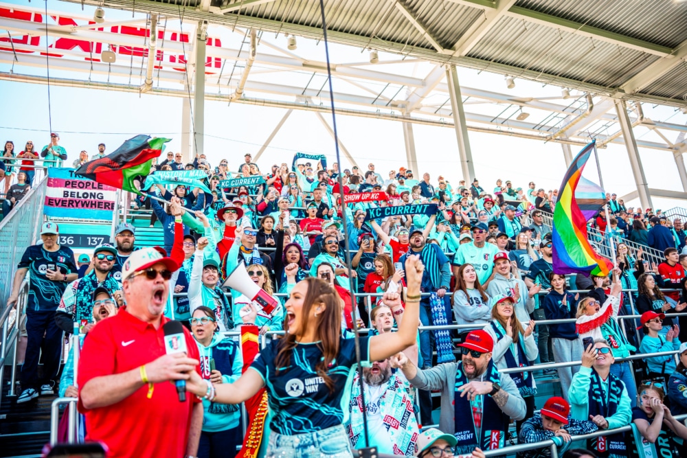 Eric Stonestreet saying KC Baby in the supporters section.