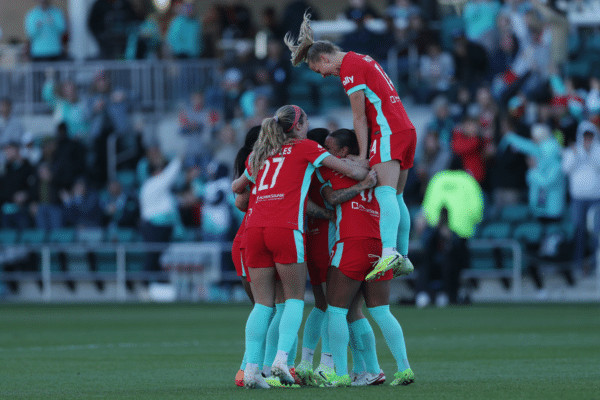 Kayla, Michelle and Claire are celebrating.