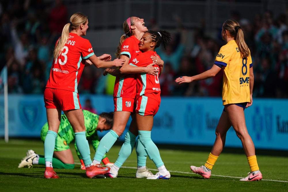 Players celebrating a goal.