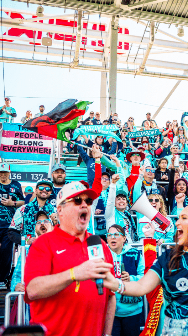 Eric Stonestreet saying KC Baby in the supporters section.