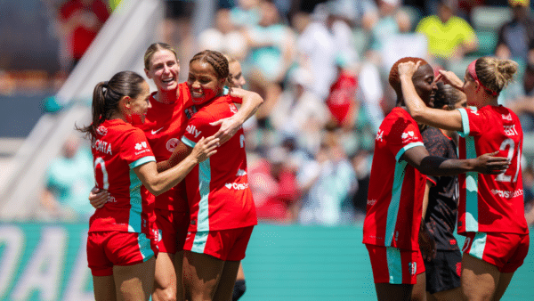 Lo, Haley and Laney celebrating goal.
