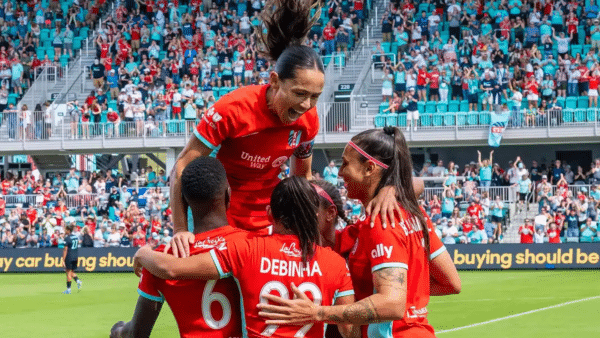 Chawinga. Deb, Bia, Cooper, and Lo are celebrating a goal.