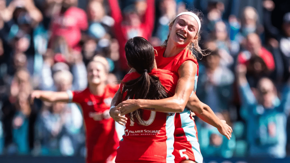 Lo and Ellie are celebrating a goal.