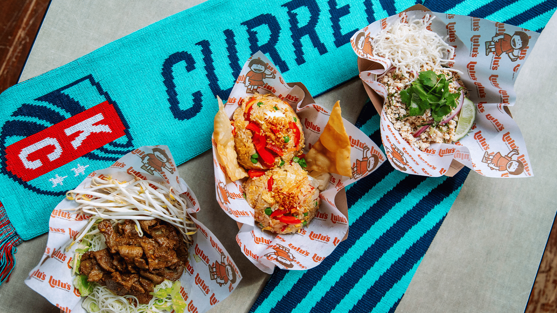 Photo of the three dishes that will be featured at CPKC Stadium from Lulu's Thai Noodle Shop