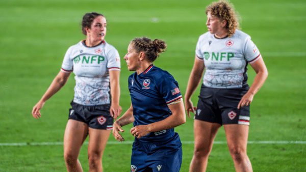 Photo of women's rugby players.